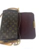 Flap open flat with the gold plate and chain
