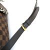 Shoulder strap and adjustment buckle
