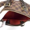 Handle tabs above the open top zip