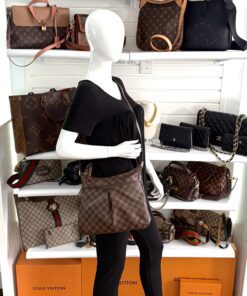 Styled on a mannequin, worn crossbody