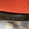 Date code SP2100 stamped on the leather tab