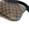 Close up of the Damier canvas and leather piping