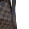 Side close up with the leather shoulder strap